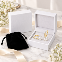 Pearl huggie earrings gift presentation