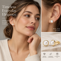 Pearl stud earrings worn on ear